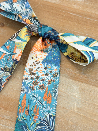 satin like skinny scarf with blue safari print