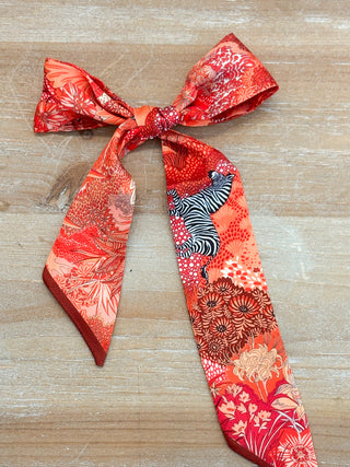 red safari print skinny satin like scarf