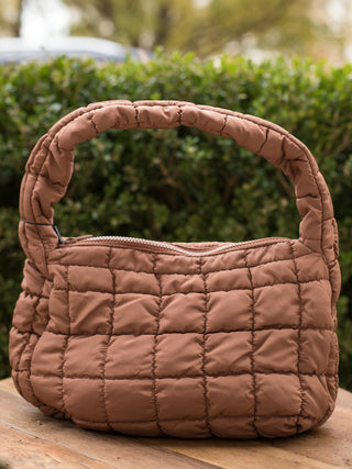 wear this caramel brown quilted handbag as an everyday accessory or gift for the christmas and holiday season
