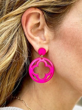 vibrant pink resin drop earrings with clover geometric design