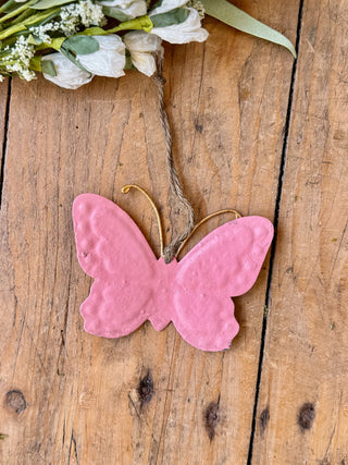pink paper mache and metal butterfly ornament