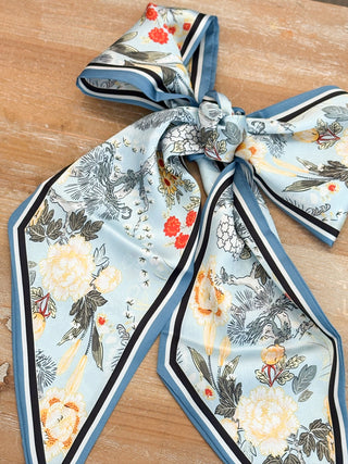 a blooming blue toile skinny scarf tie made from silky soft polyester