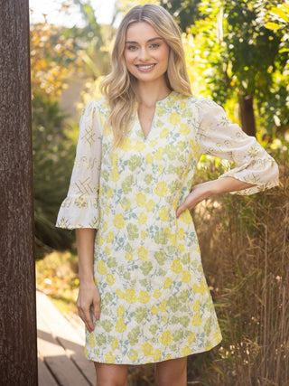 green and yellow mini dress with quarter length sleeves and split v neck 