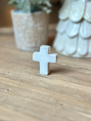 an adorable white ceramic pocket cross gift