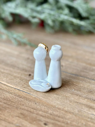 a white ceramic nativity scene pocket gift