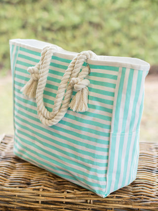 Classic beach bag or summer tote with teal and white stripes and nautical rope handles