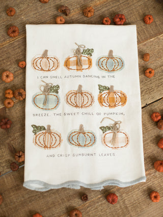 an off white hand towel with embroidered pumpkins with a sweet autumn sentiment perfect for fall and thanksgiving decor