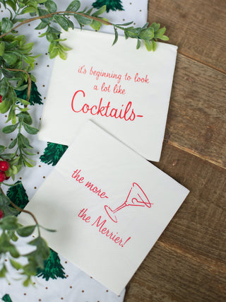 two styles of white and red christmas cocktail napkins perfect for holiday home decor and funny host gifts