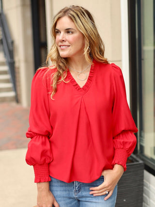 a romantic red top with statement sleeves perfect for summer to fall and valentines day