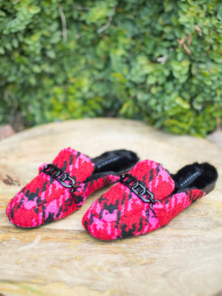 a pair of pink and red plaid loafer mules with furry lining and memory foam perfect for everyday chic fashion