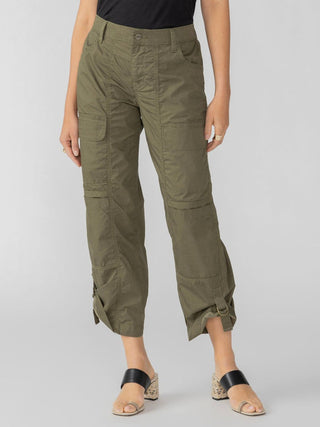a pair of cargo pants in green with multiple pockets perfect for summer to fall fashion 