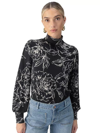 a girly silk blouse with a black and white rose stencil print