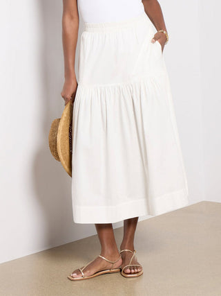 a white cotton poplin prairie midi skirt with elastic waist band  