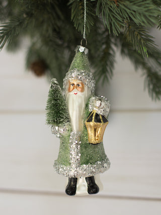 a green and silver santa claus figurine christmas tree ornament with glitter perfect for holiday home decor