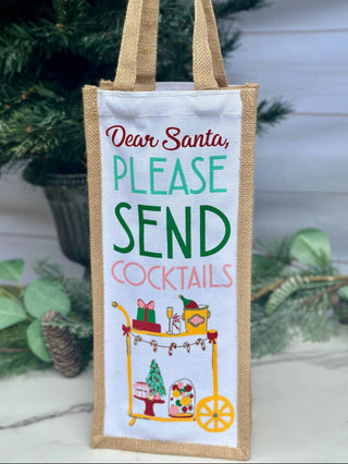 a holiday gift wine tote bag that says dear santa please send cocktails