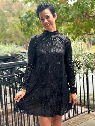 a fun black sequin mock neck party mini dress with long sleeves