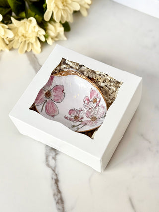 a charming ceramic shell jewelry dish with pink dogwood flowers in a box
