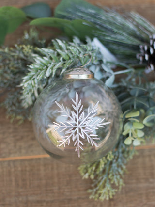 put this clear and white snowflake ornament on your christmas tree as holiday decor or gift as a stocking stuffer