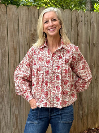 red and white floral print button up long sleeve top with pleats