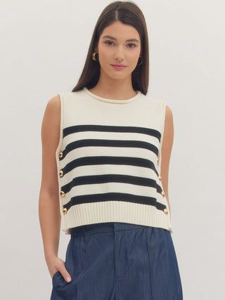a soft cream and black striped sleeveless sweater top with gold buttons