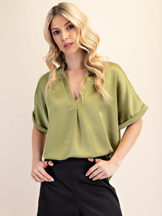 green v neck silky ivory blouse with short sleeves