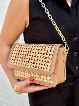 tan leather purse with woven rattan inspired panel gold chain 