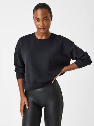 a lightweight black sweater great to wear on its own or as a layer perfect for yearround luxury wear