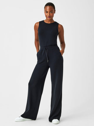 ultra soft and comfortable black spanx jumpsuit with wide legs and pinch draw string waist