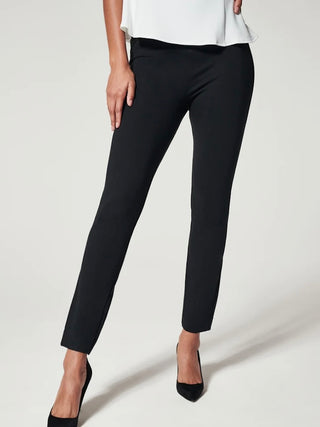 a pair of black stretch skinny pants in slimming material that hits at the natural waistline perfect for mixing and matching