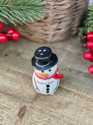 a ceramic snowman salt and pepper shaker