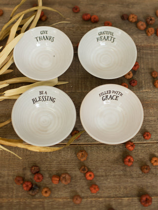 off white stoneware miniature serving bowls with black stamped type sentiments perfect for thanksgiving decor