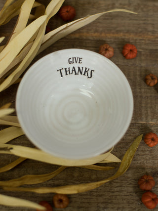 an off white stoneware miniature serving bowl that reads give thanks perfect for thanksgiving decor