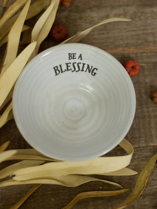 an off white stoneware miniature serving bowl that reads be a blessing perfect for thanksgiving decor