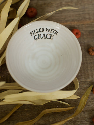 an off white stoneware miniature serving bowl that reads filled with grace perfect for thanksgiving decor