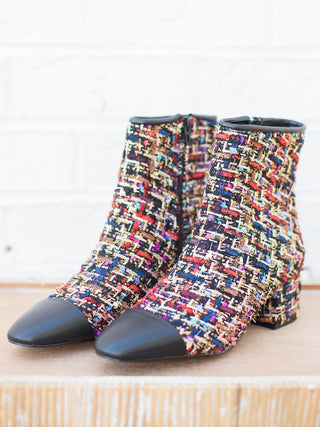wear these multicolored tweed boots with a leather toe and block heel to christmas and holiday activities as a statement shoe