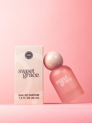 frosted pink bottle of passion fruit sparkling tea and classic patchouli