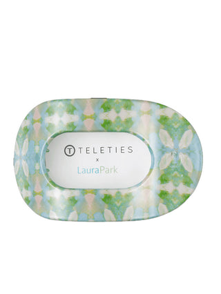 a light spring green floral flat round teleties hair clip