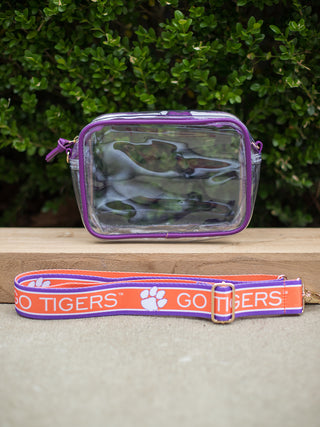 stadium approved clear bag with purple edges and an orange crossbody strap with clemson university logos and reads go tigers