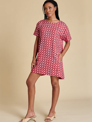 a casual cute crewneck mini dress with the red georgia bulldogs logo paired with nude heels