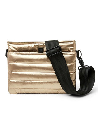 a metallic gold luxury bum bag with a detachable strap