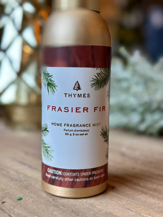 the frasier fir home fragrance wintery mist in a golden pine can