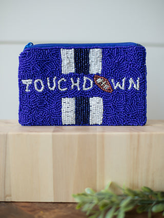 a university of kentucky game day coin bag designed with blue and white beading and reads touchdown with a football