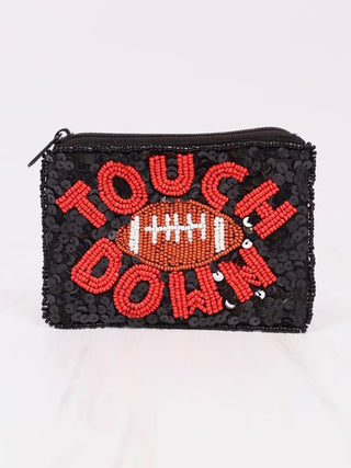 a black and red football sequin coin pouch that says touch down