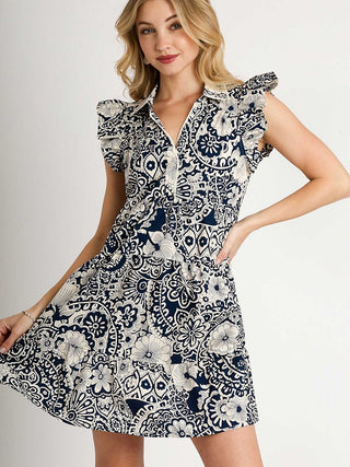 a navy blue floral and paisley print babydoll dress with fun flair