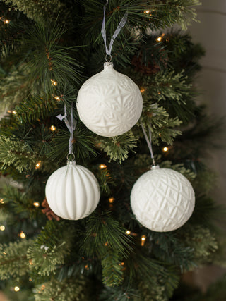 a set of white christmas tree ornament in classic textures perfect for holiday home decor and stocking stuffer gifts