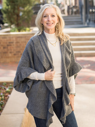 wear this gray open front cardigan with ruffles to holiday and christmas gatherings for a chic winter look with all black