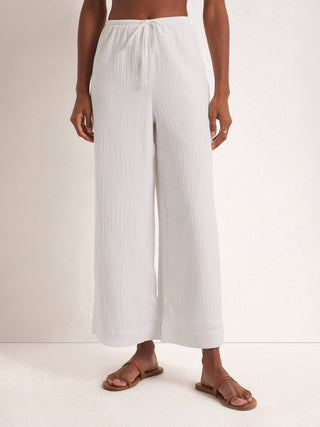 white relaxed fit wide gauze pants with elastic waste and drawcord