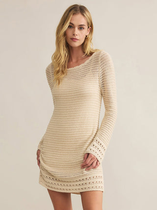 a flattering tan cotton knit mini dress with long sleeves