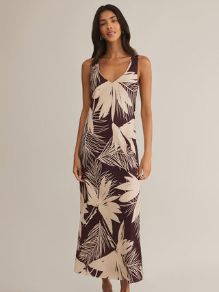 a breezy loose fit satin v neck maxi dress with a brown and cream lava rock pattern