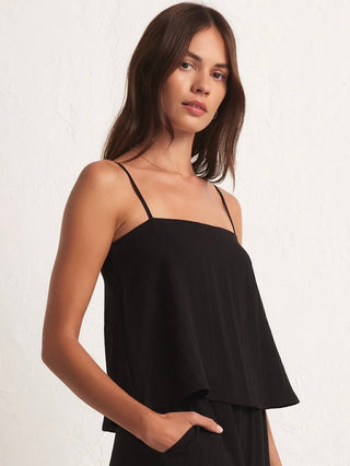 a black spaghetti top with square neckline and relaxed fit 
